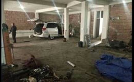 Aseguran predio con vehículos robados en Huixquilucan