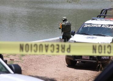 Localizan cadáver embolsado en presa de Tlaxcala