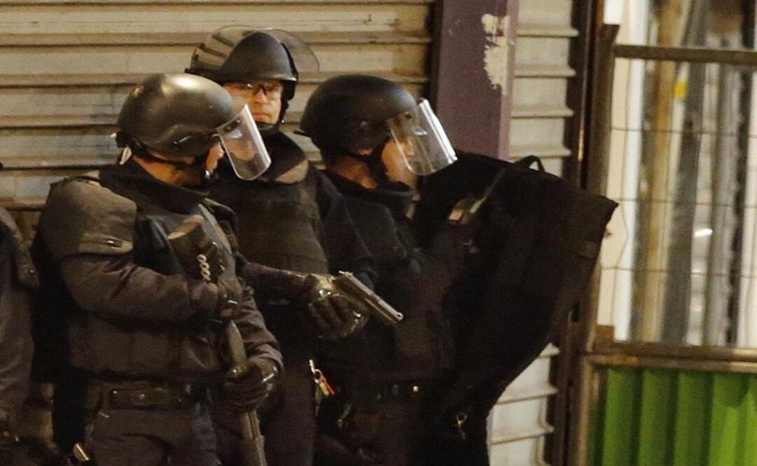 Seven people were arrested in the operation, which started with a barrage of gunfire. (Photo: Reuters) 