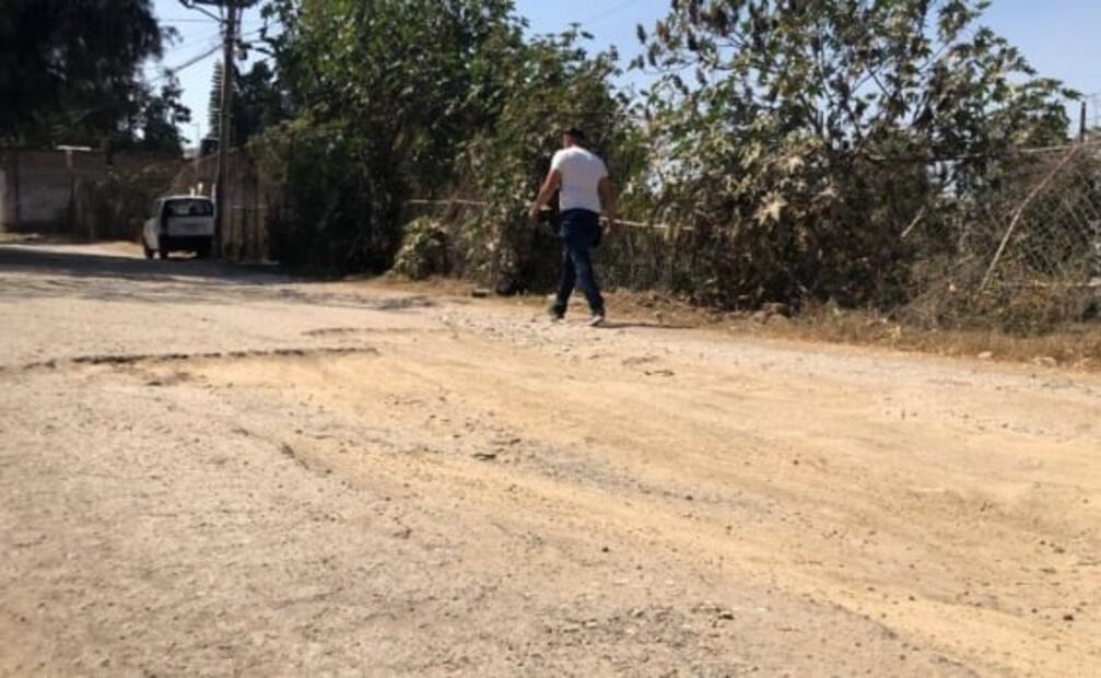 VIDEO Esta es la calle que lleva 20 años sin pavimentar por estar entre Coacalco y Tultitlán, en Edomex