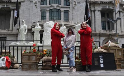 ¿Qué significan las esculturas de "La casa de papel" en el Palacio de Bellas Artes?