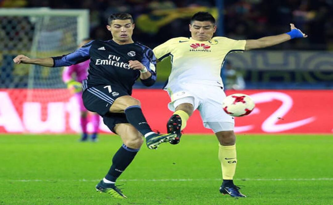 Real Madrid's Cristiano Ronaldo and Club América's Paolo Goltz - Photo: AP 