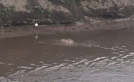 Abandonan cadáver maniatado en un río de Chalco