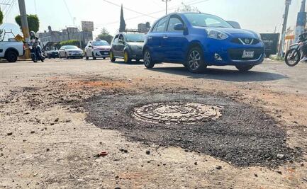 Cubren socavón de 2 metros de diámetro en Neza tras denuncia hecha por EL UNIVERSAL