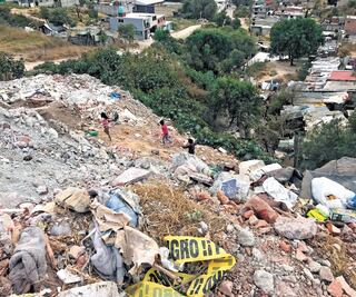 Vecinos hallan el cuerpo sin vida de una mujer en una barranca de Ecatepec