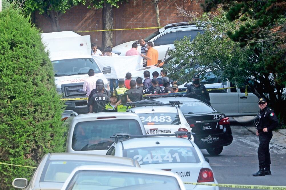 Los policías murieron en el fraccionamiento Lomas Verdes. (JUAN PEREA. EL UNIVERSAL)