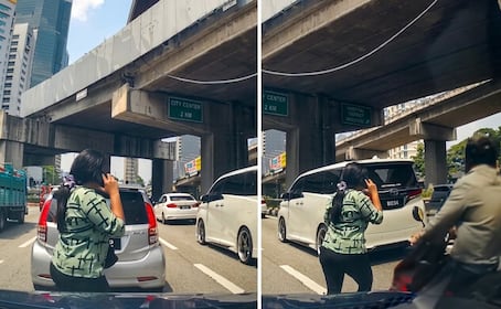 Mujer es atropellada mientras usa el celular al cruzar la calle por un motociclista en Malasia 